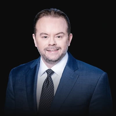 chuck-blue-suit-headshot